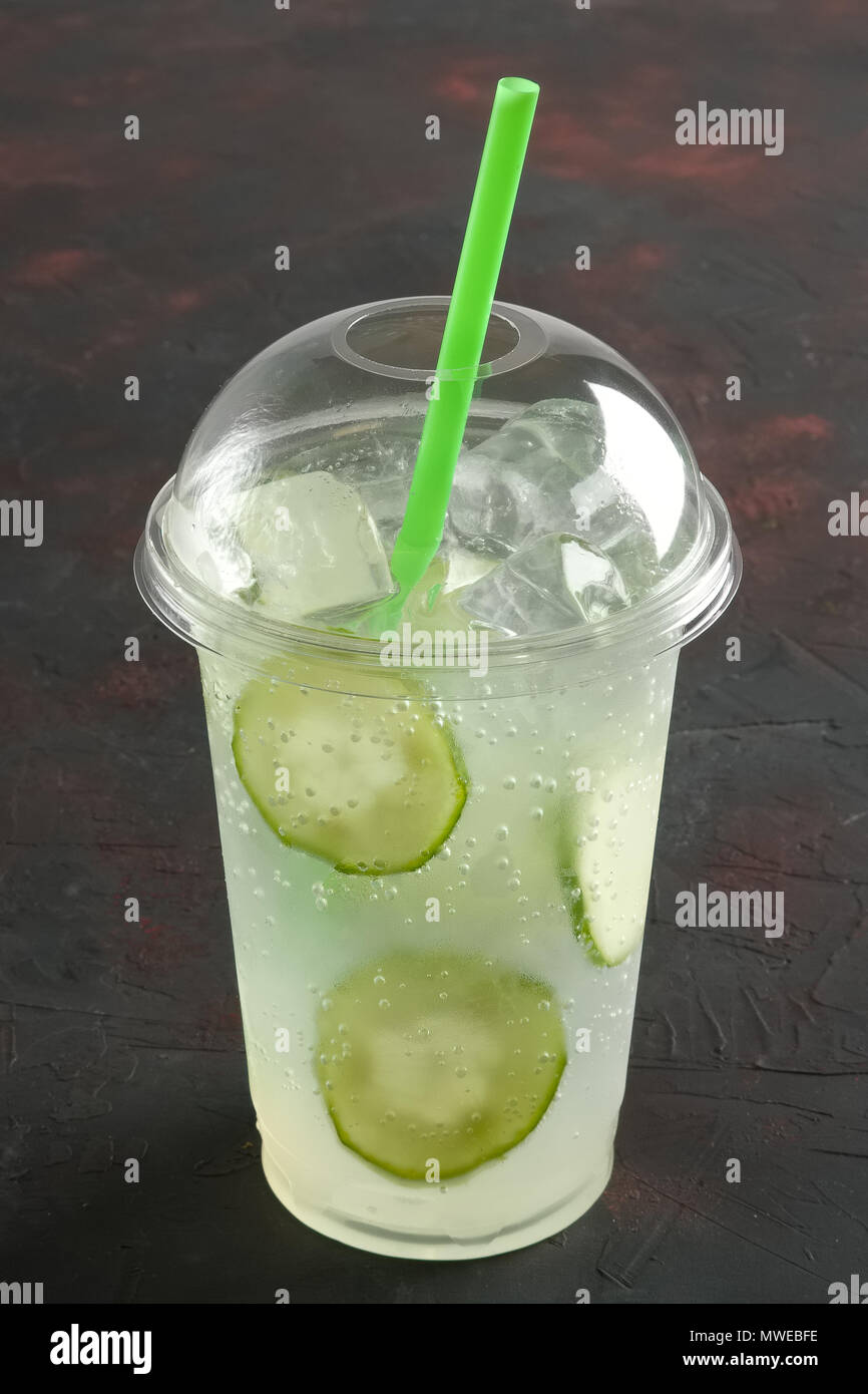 Fresh Cold Cucumber Ice Drink In Take Away Plastic Glass With Straw 