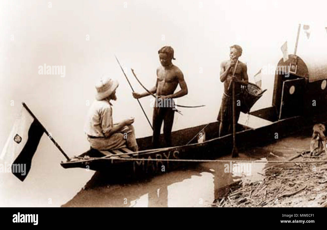 . On 'Maryś' (in Polish means: Mary) boat on an African river. The photo probably taken by Kazimierz Nowak (1897-1937, the author is on the photo; taken probably by a self-timer) during his trip through Africa - a Polish traveller, correspondent and photographer. Probably the first man in the world who crossed Africa alone from the North to the South and from the South to the North (from 1931 to 1936; on foot, by bicycle and canoe). circa about 1931-36. probably Kazimierz Nowak or an unknown author 404 Marys boat Stock Photo