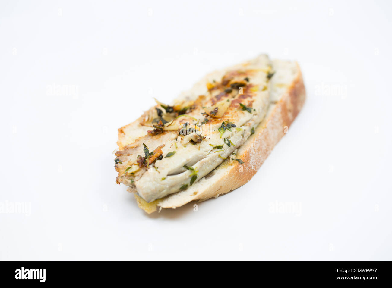 An open sandwich comprising of a mackerel fillet from a mackerel, Scomber scombrus, caught from Chesil beach in Dorset on rod and line. It has been fr Stock Photo
