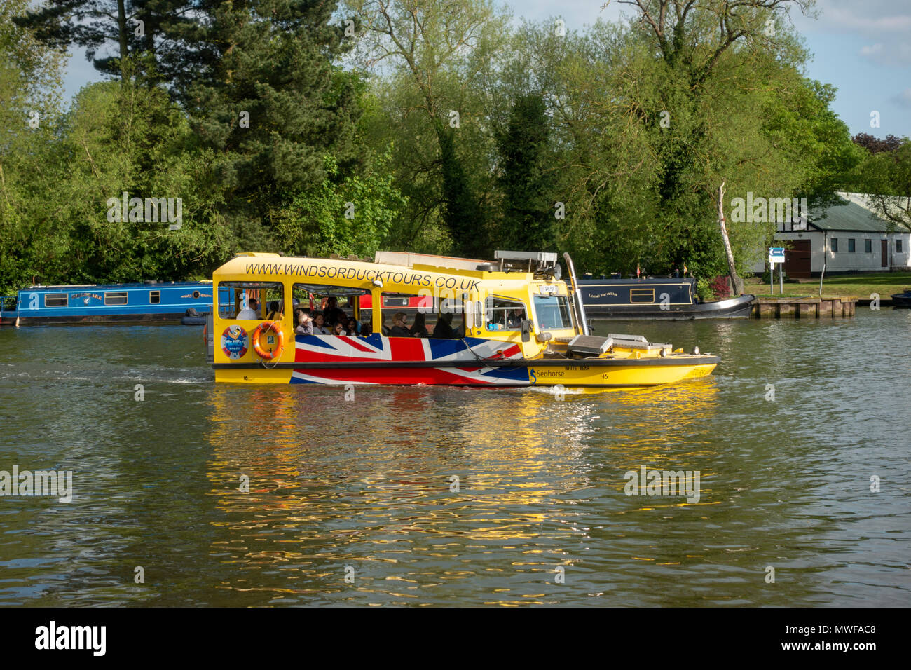 The Windsor Duck Tours 'White Bear' DUKW tour boat cruising on the  River Thames, UK. Stock Photo