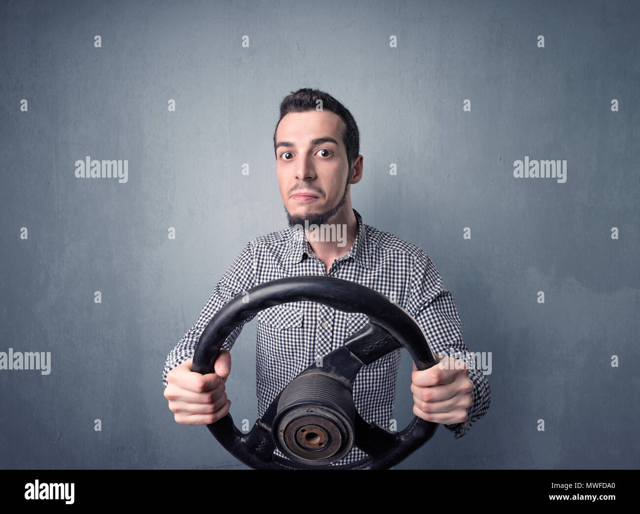 Hands on steering wheel front view hi-res stock photography and images ...