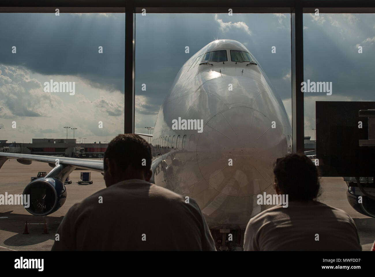 Atlanta airport, Boeing 747, two passengers waiting for departure Stock Photo