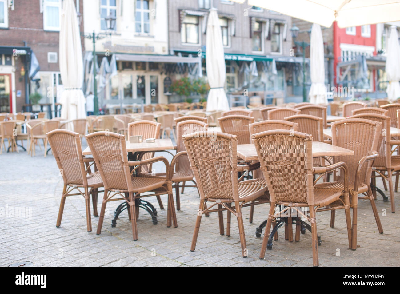 Tables in a cafe on the square of Bergen op Zoom in Holland. Travel in