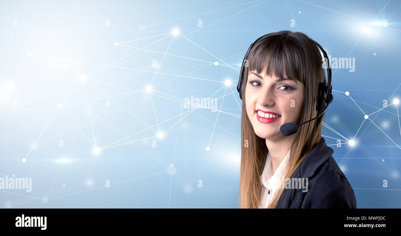 Young female telemarketer with blue background and connectivity concept ...