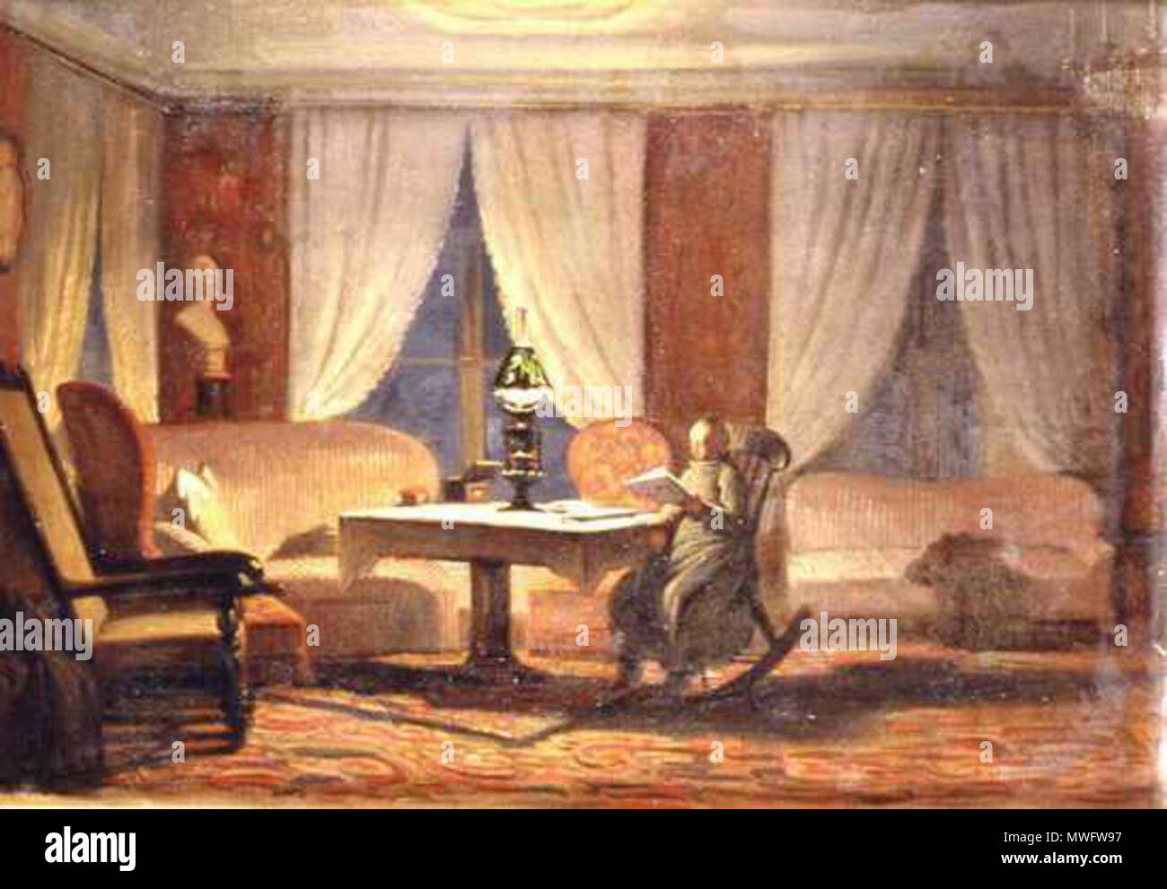 317 Johan Zacharias Blackstadius, Salongsinteriör, dam i gungstol, brinnande lampa på bordet, 1850 Stock Photo