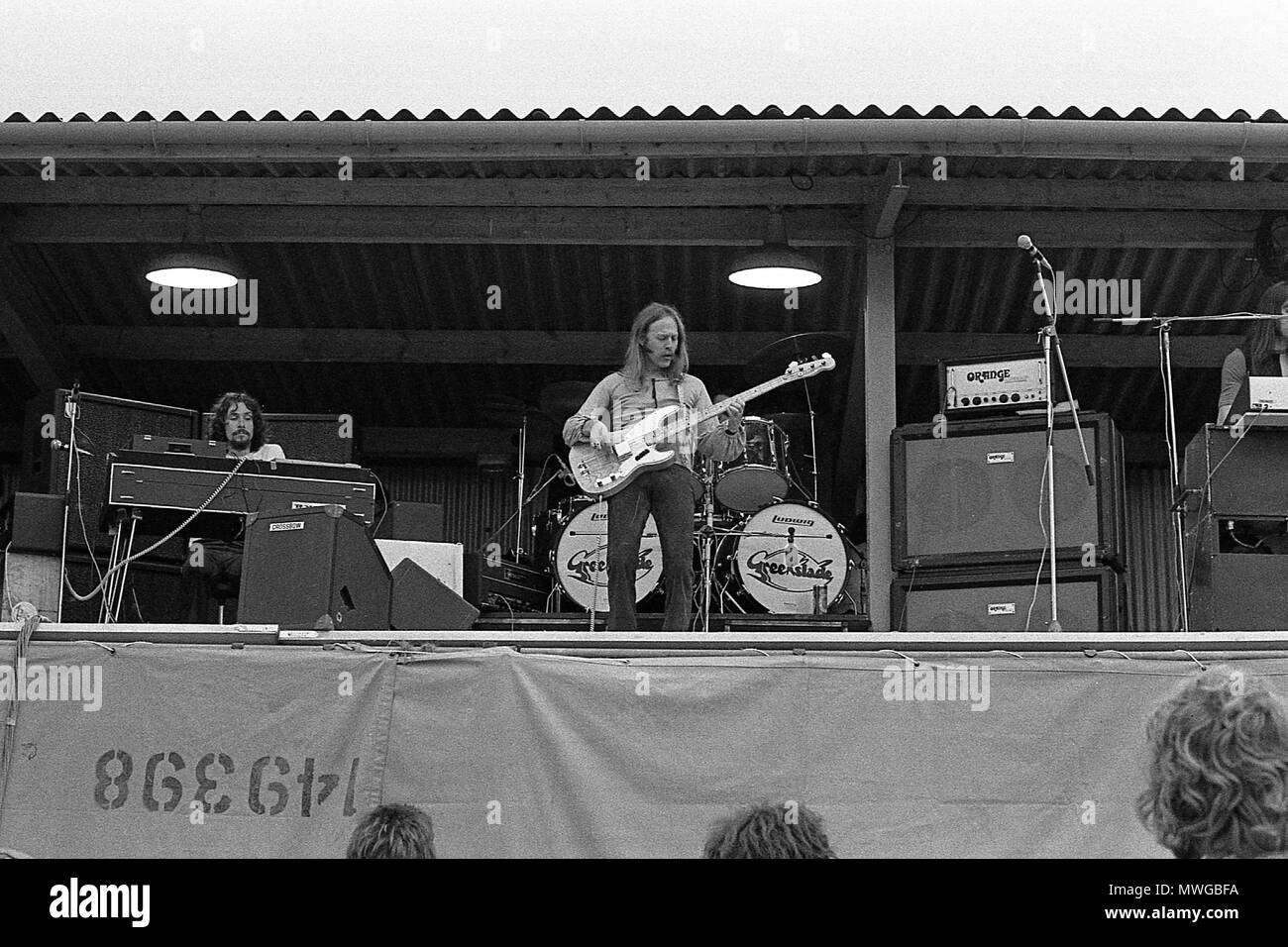 Dave Greenslade of the band Greenslade playing a Fender Bass on stage at Kendal Music Festival 1973 Stock Photo