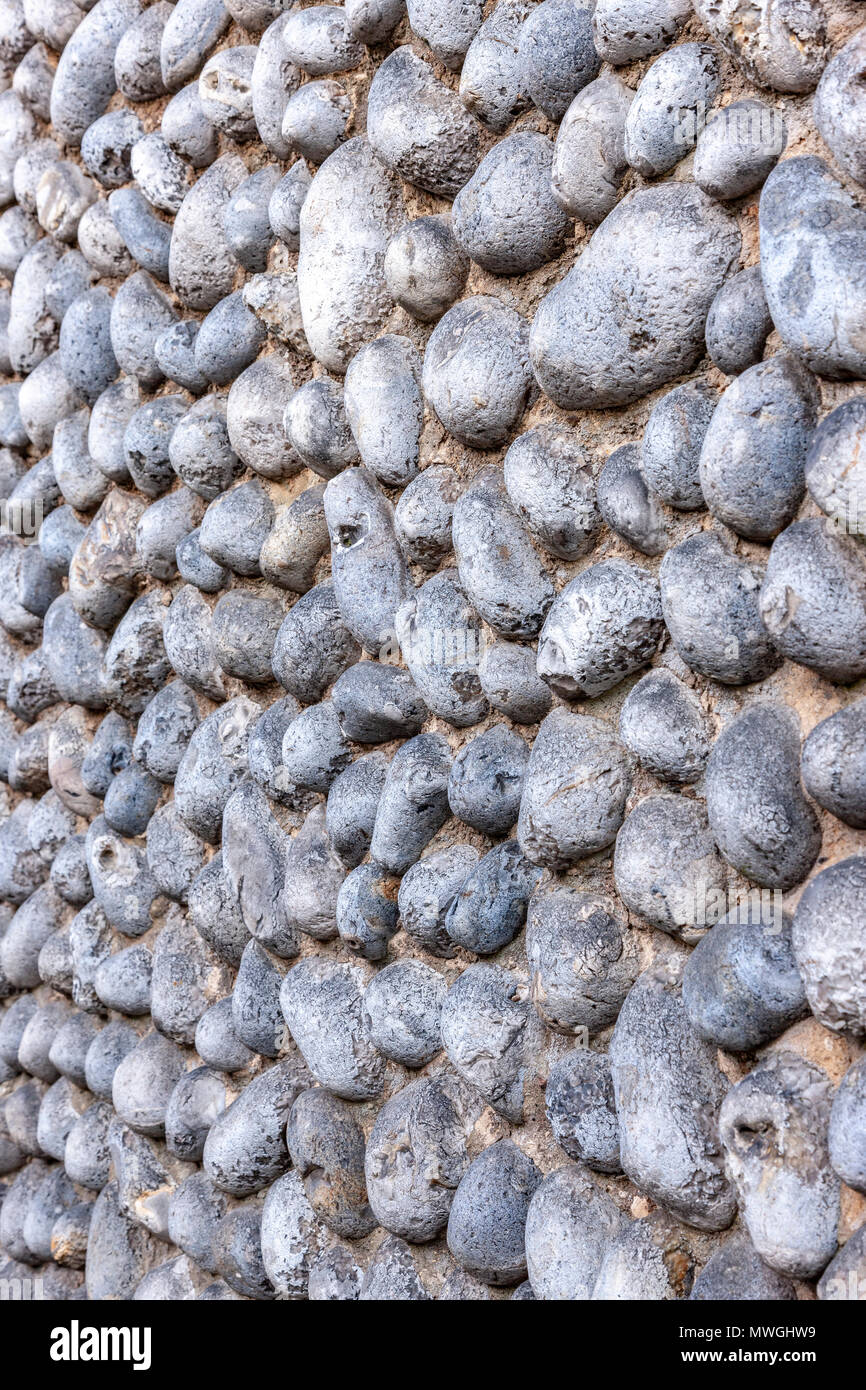 Cottages and walls built with Flint pebbles in Blakeney Norfolk, UK. Stock Photo