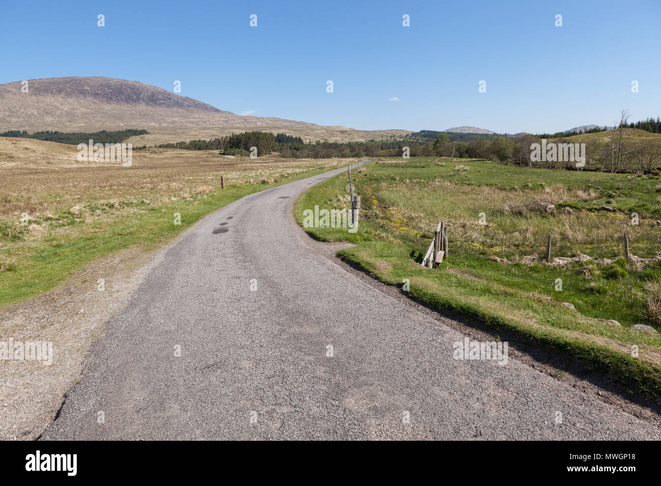 Empty road on the West Highland Way near Inveroran, Scotland. Stock Photo