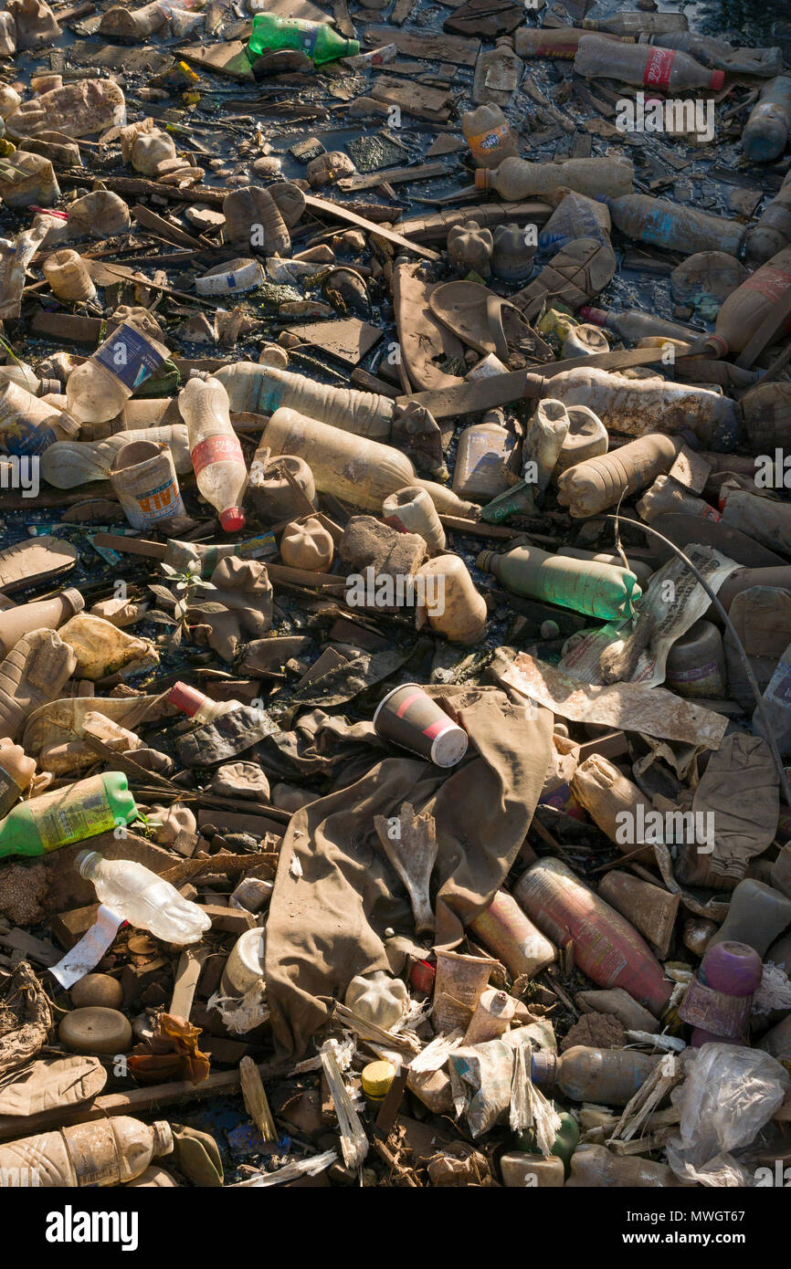 Plastic bottles and other trash, blocking drainage ditch, Ngong Road, Nairobi, Kenya - 31 May 2018 Stock Photo