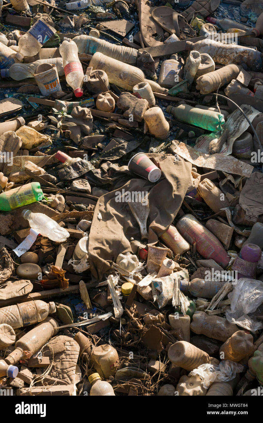 Plastic bottles and other trash, blocking drainage ditch, Ngong Road, Nairobi, Kenya - 31 May 2018 Stock Photo
