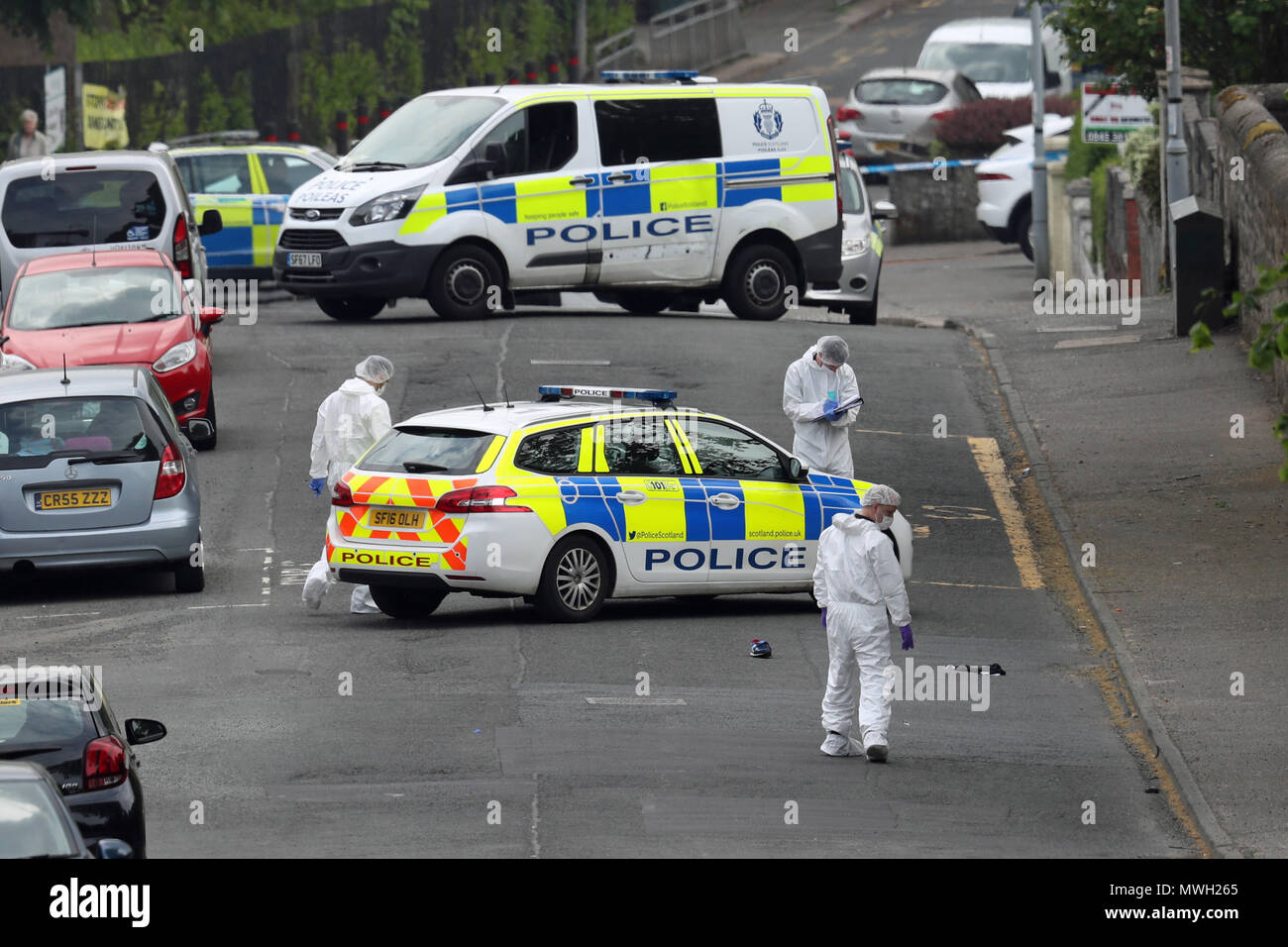 Forensic officers at the scene of an incident in Gateside Gardens