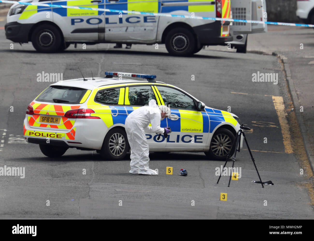 Forensic officers at the scene of an incident in Gateside Gardens