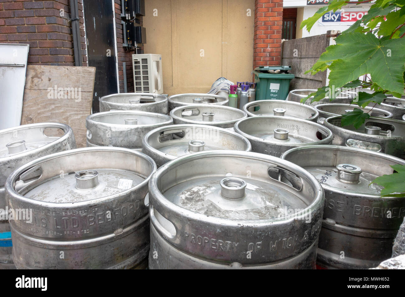 Empty beer barrels waiting to be collected by the brewery after a function. Stock Photo