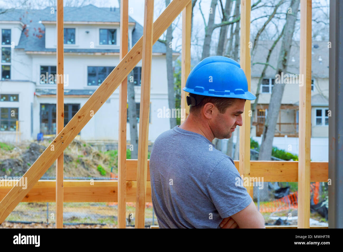 Construction Worker Building Timber Frame In New Home Stock Photo - Alamy