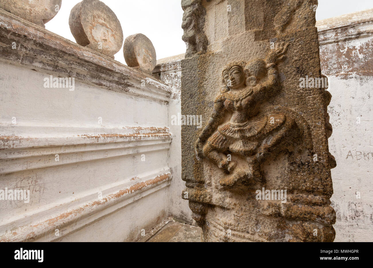 Architectural details of Bahubali gomateshwara Temple. Sculptures Hindu – jain deities seen on the walls. Stock Photo