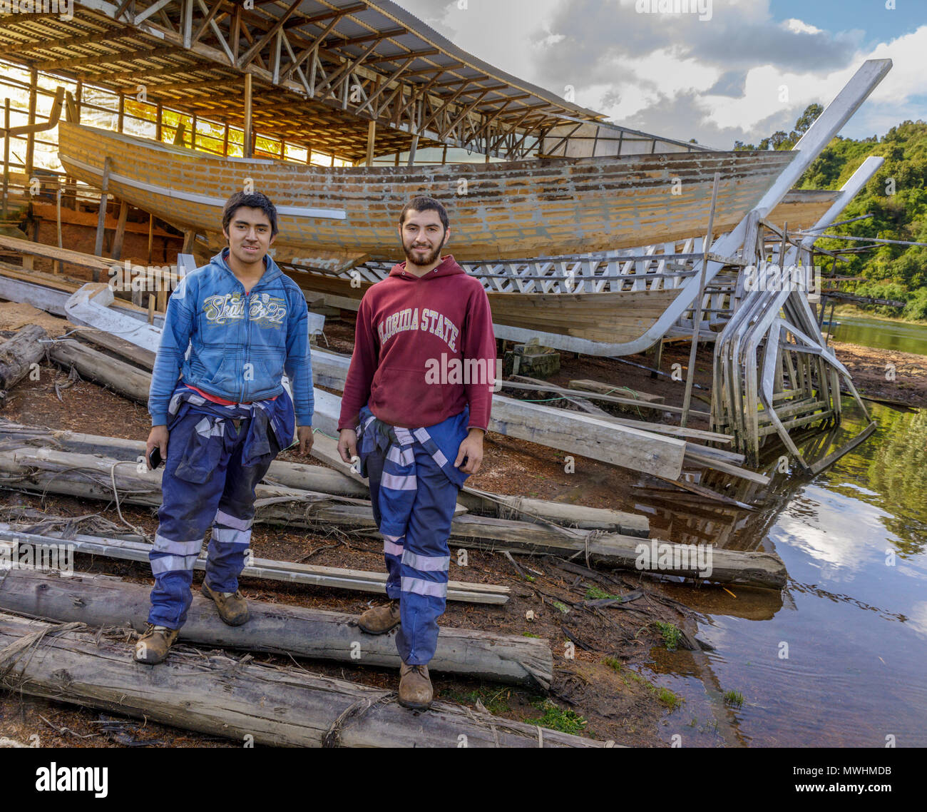 Chiloé Island, Chile: Two welders in the shipyard at San Juan, Chiloé Island. Stock Photo
