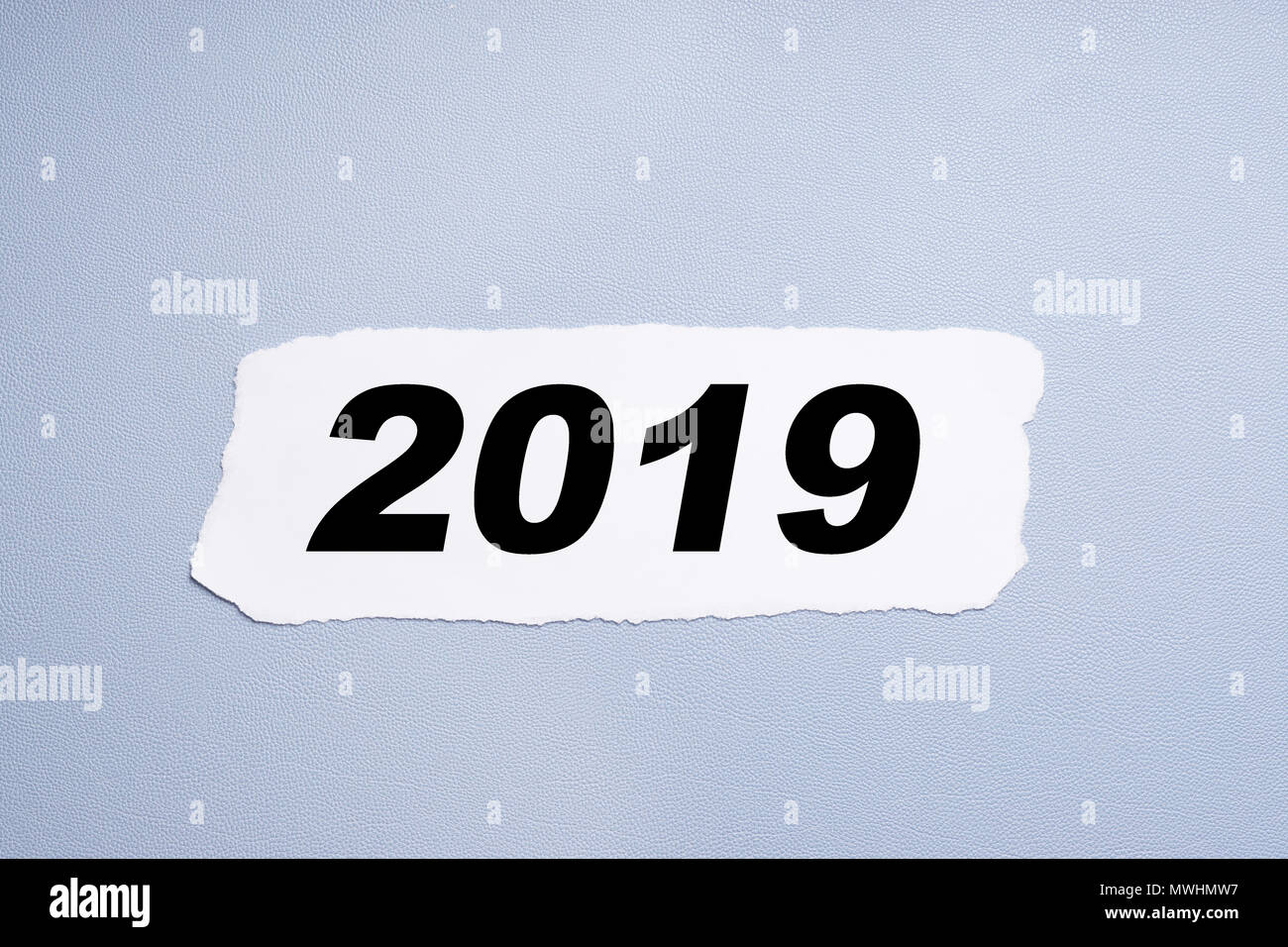 2019 printed on torn piece of paper, year or number Stock Photo