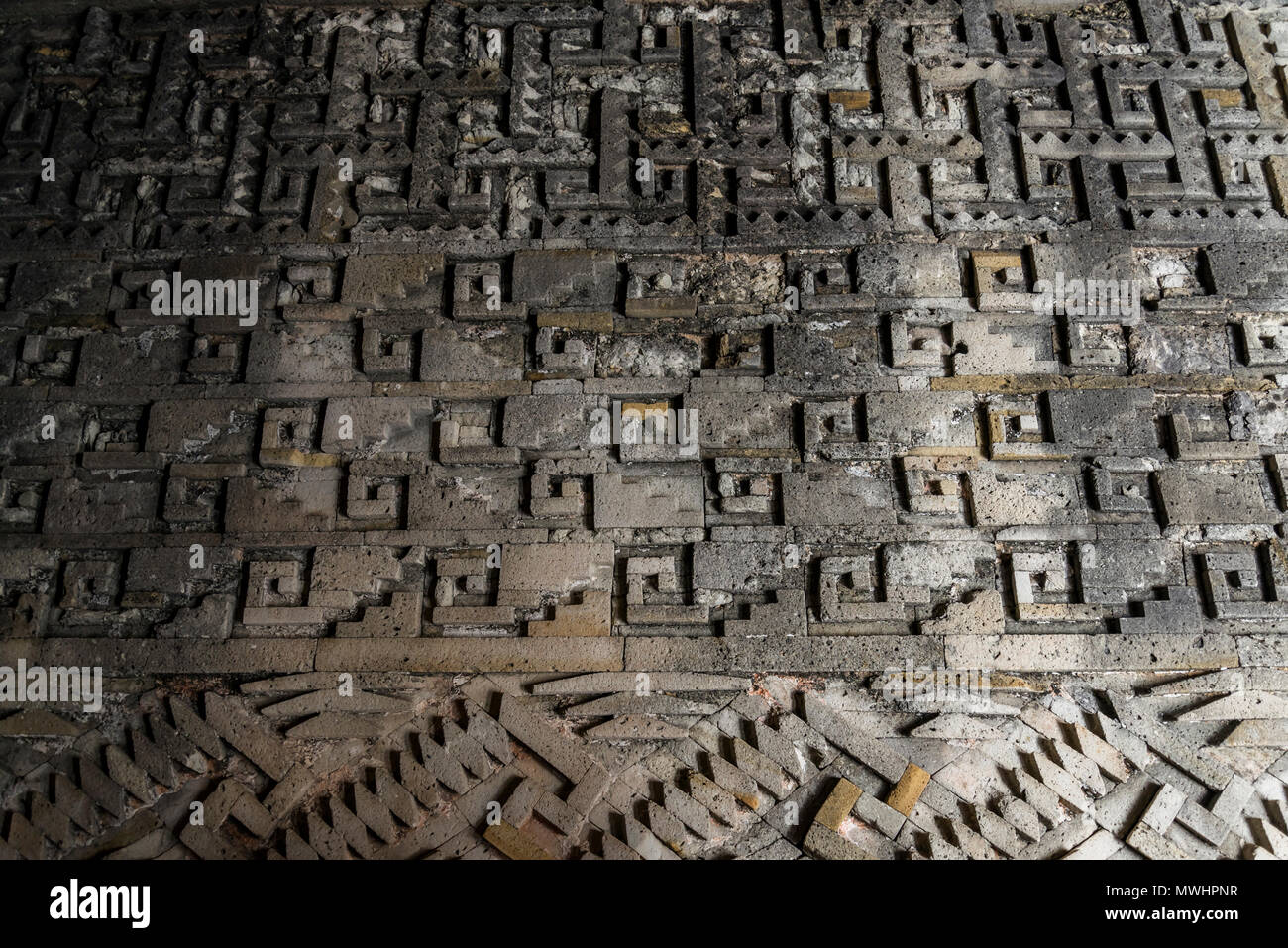 Mitla, pre-columbian archeological site of the Zapotec culture. Close up of intricate mosaic fretwork of the geometric patterns called grecas, situate Stock Photo