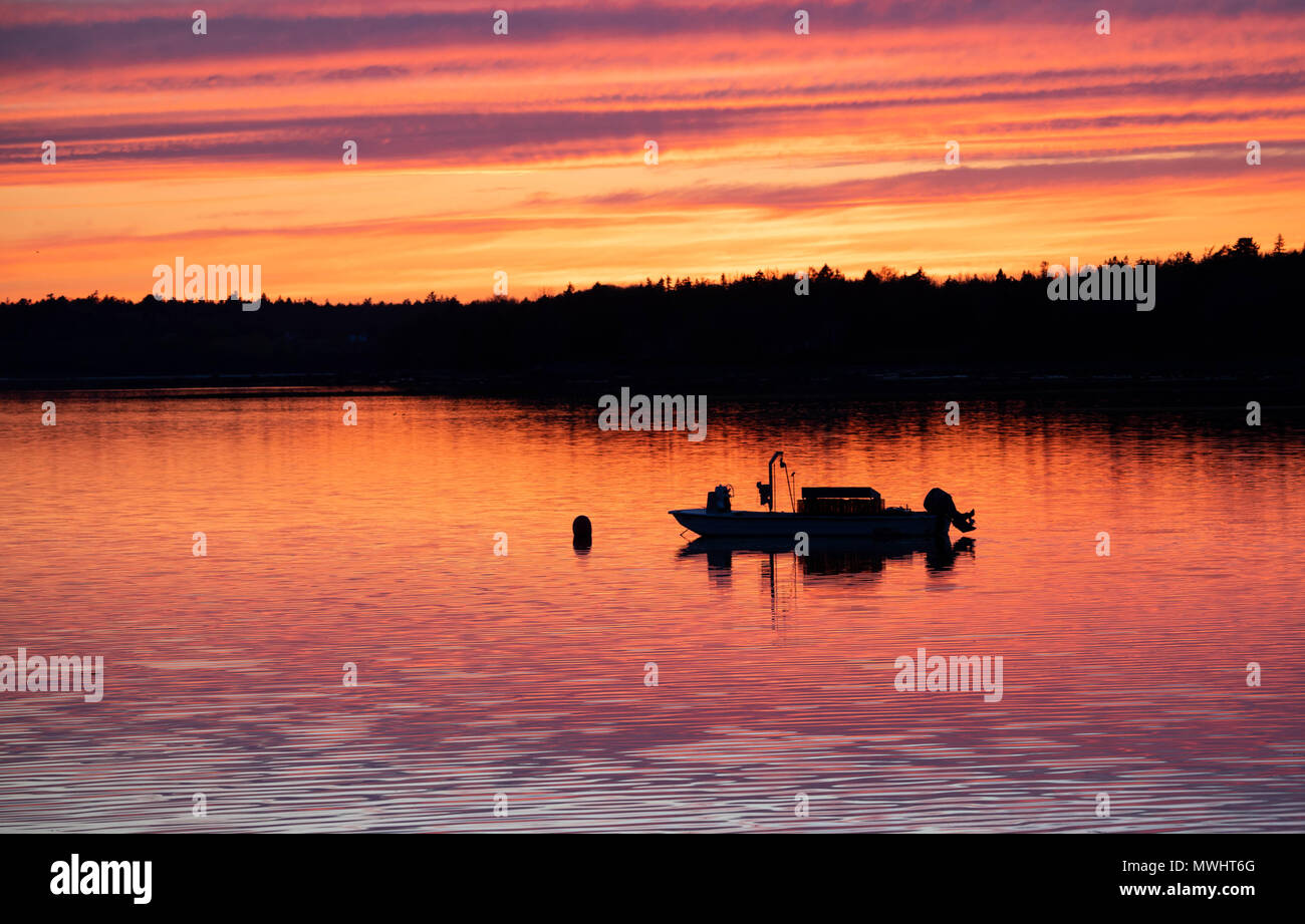 Fishing Boat in Sunset Stock Photo - Alamy