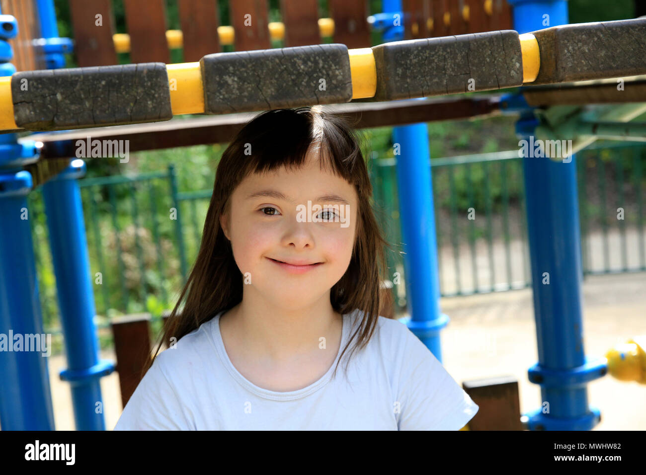 Portrait of little girl smiling in the park Stock Photo - Alamy