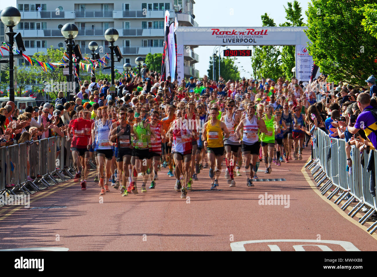 Multiple exposure image of runners taking part in the Rock n Roll marathon  in Liverpool May 2018 Stock Photo - Alamy