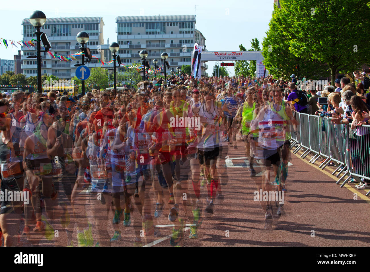 Multiple exposure image of runners taking part in the Rock n Roll marathon in Liverpool May 2018 Stock Photo