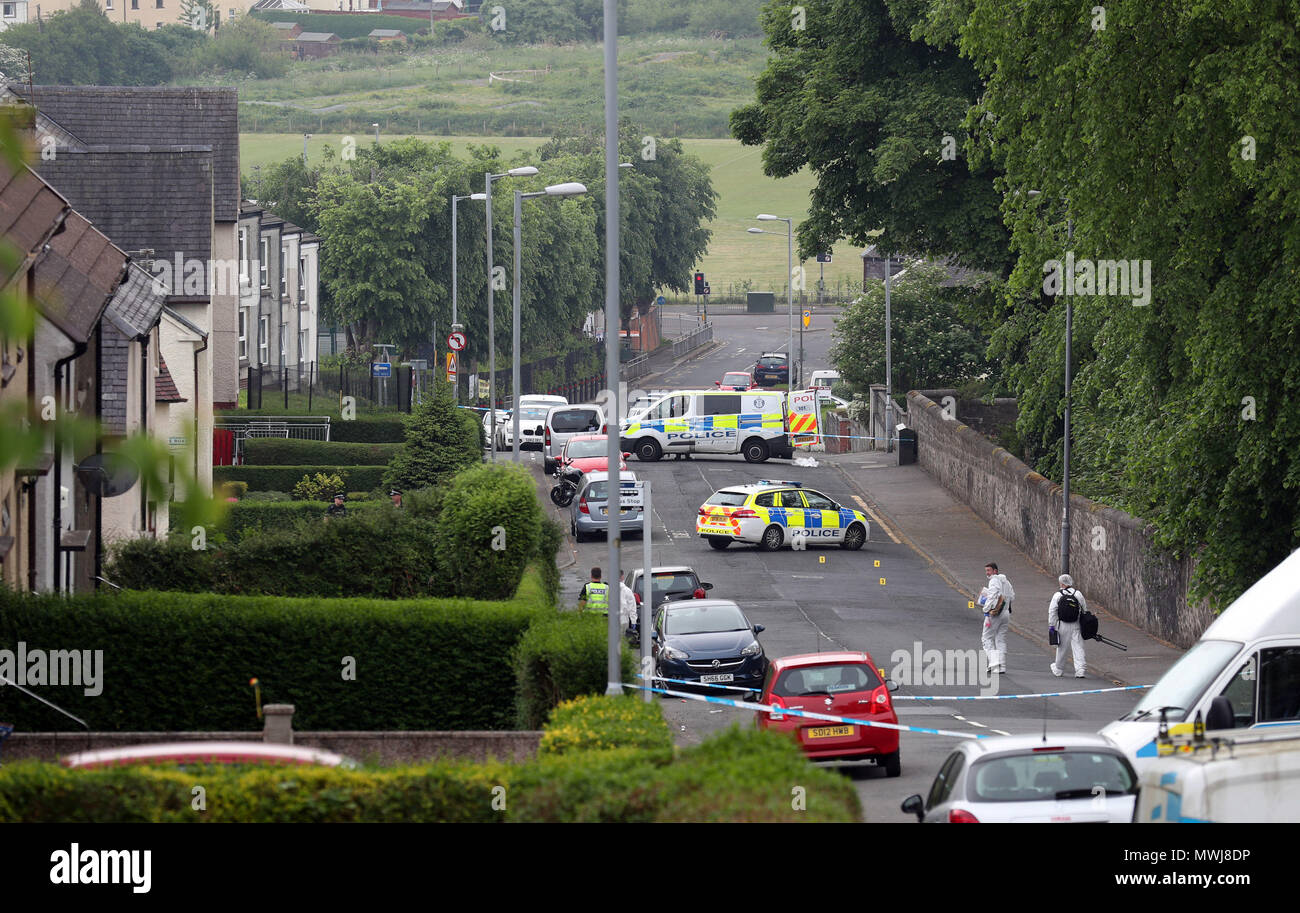 Forensic officers at the scene of an incident in Gateside Gardens