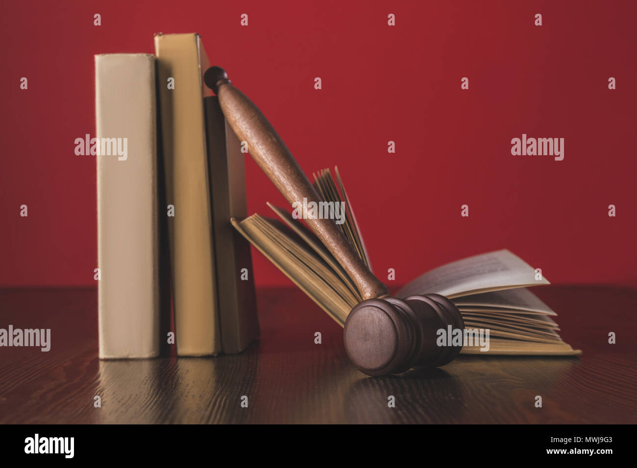 juridical books with hammer on wooden table, law concept Stock Photo