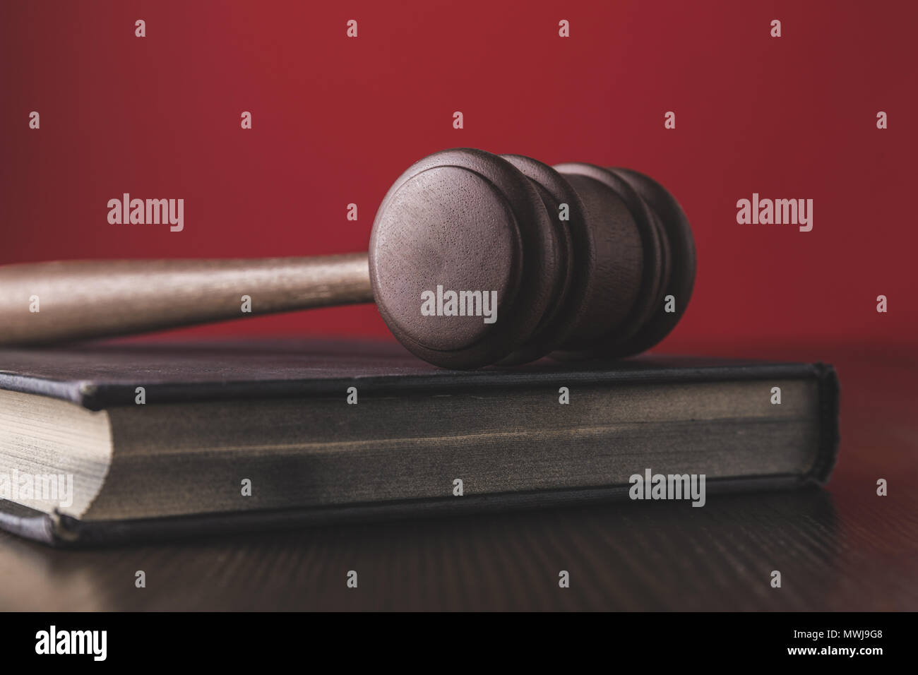 juridical book with hammer on wooden table, law concept Stock Photo