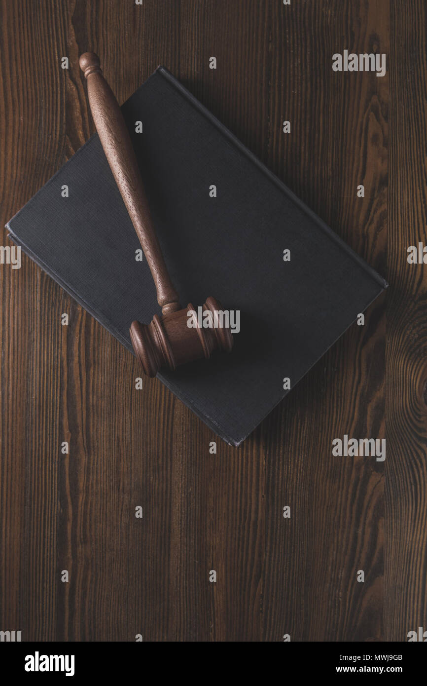 juridical book with hammer on wooden table, law concept Stock Photo