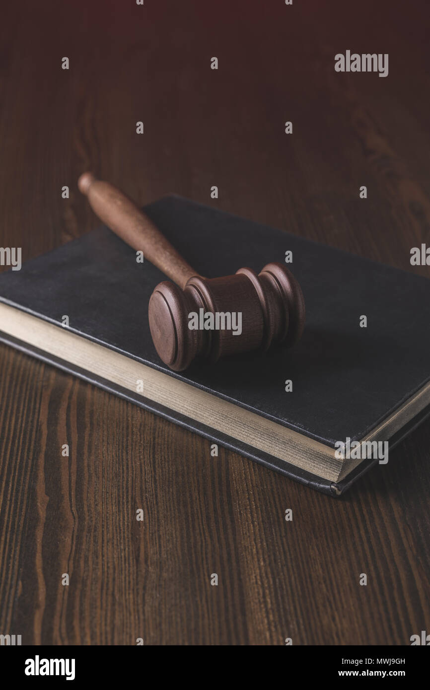 juridical book with hammer on wooden table, law concept Stock Photo