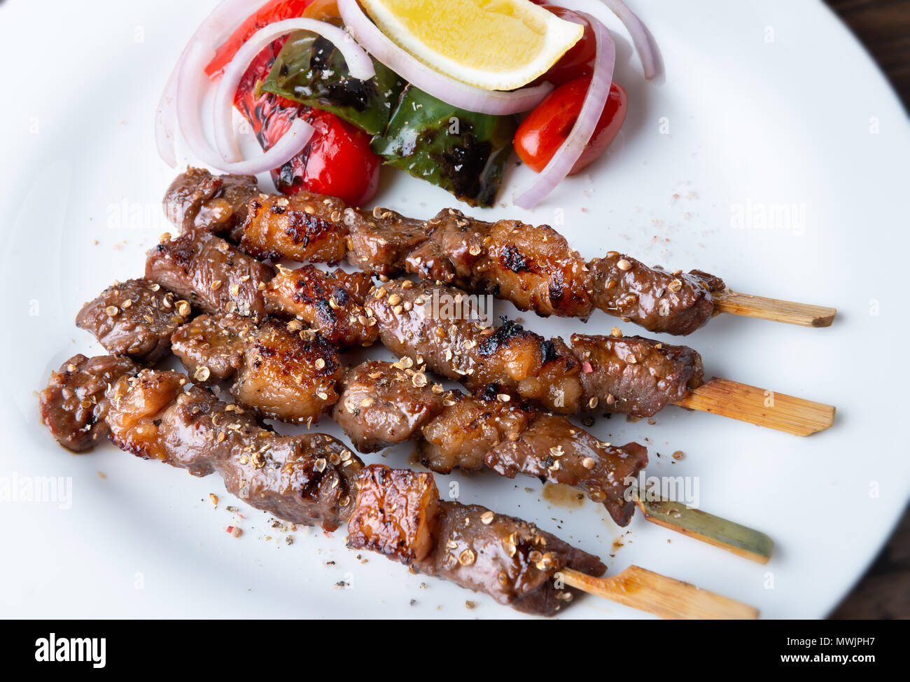 Skewer grilled beef whit seasoning in muslim style serve with vegetable
