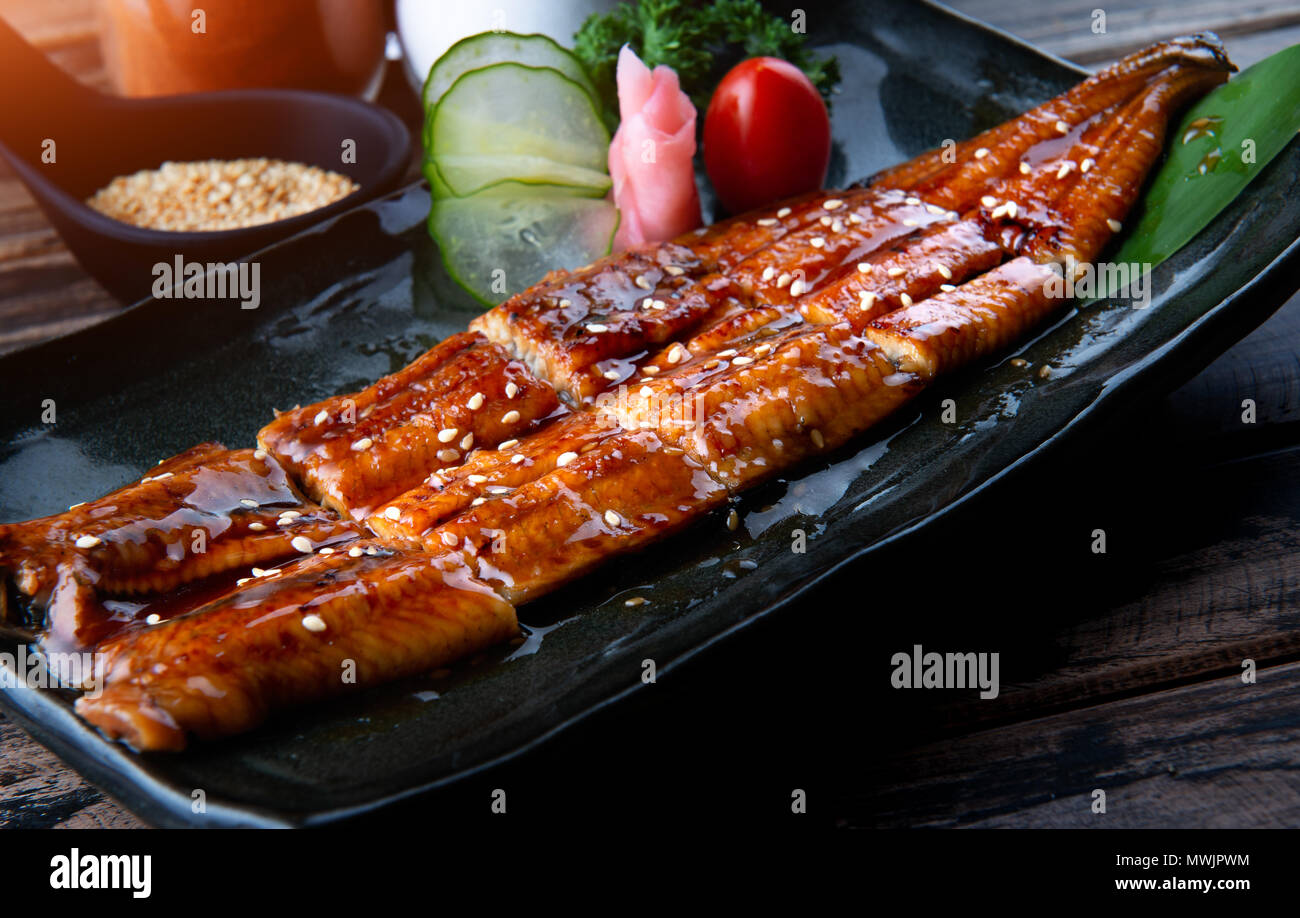 Cut Japanese eel grilled or Unagi ibaraki set on plate in Japanese