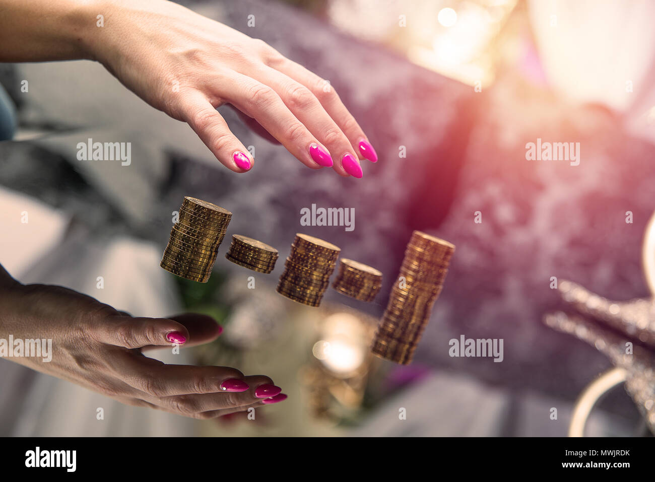 Concept of enrichment and financial growth. Gold coins. Female working