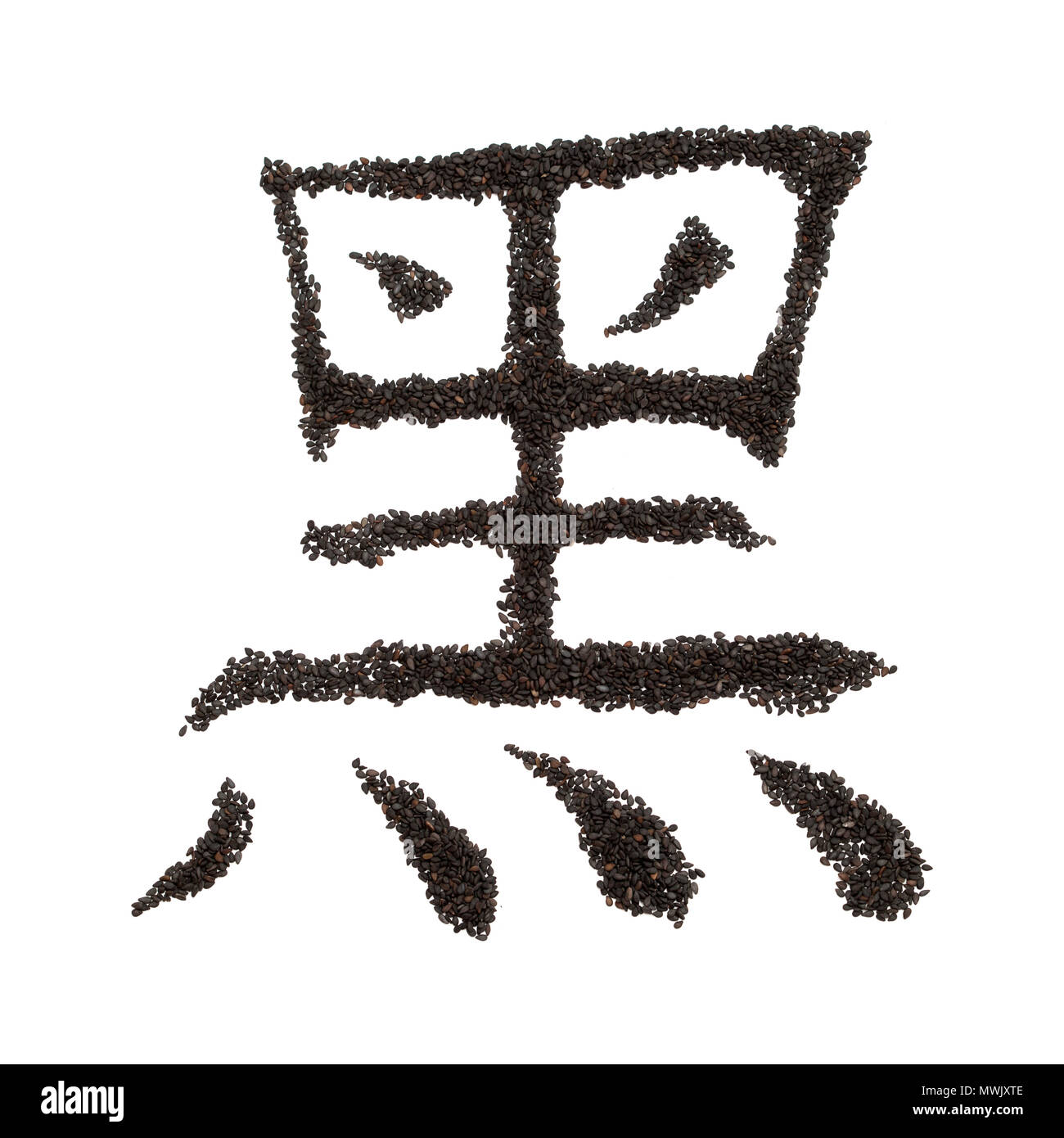 Chinese character hei - black, made of black sesame seeds on white background Stock Photo