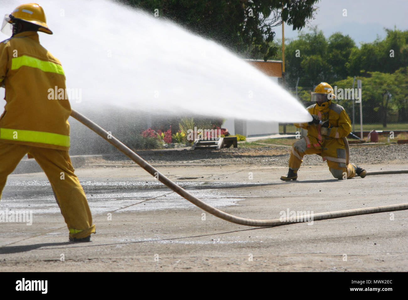 Firefighter fighting For A Fire Attack, During A Training Exercise ...