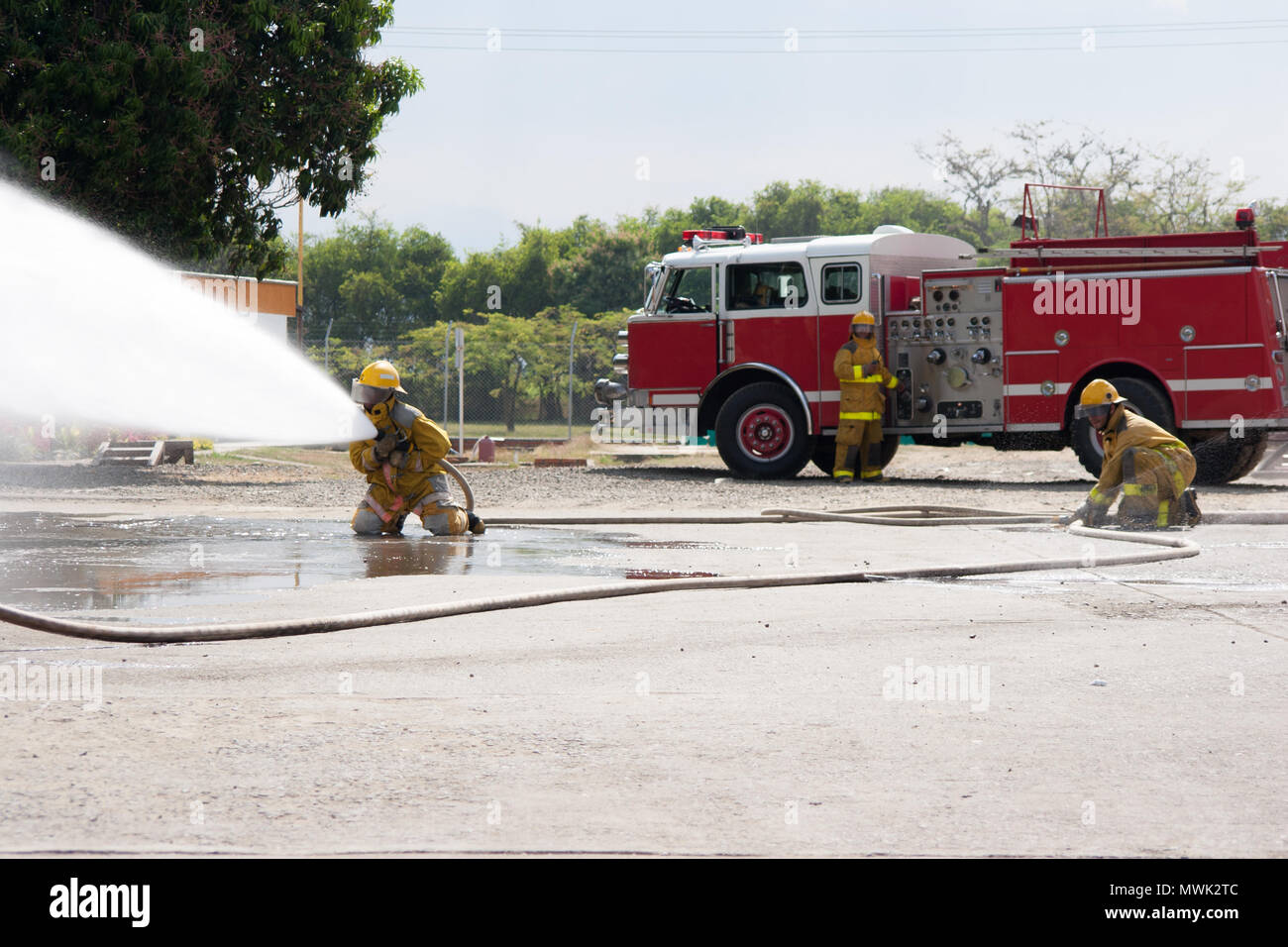 Firefighter fighting For A Fire Attack, During A Training Exercise ...