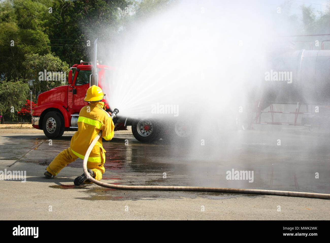 Firefighter fighting For A Fire Attack, During A Training Exercise ...
