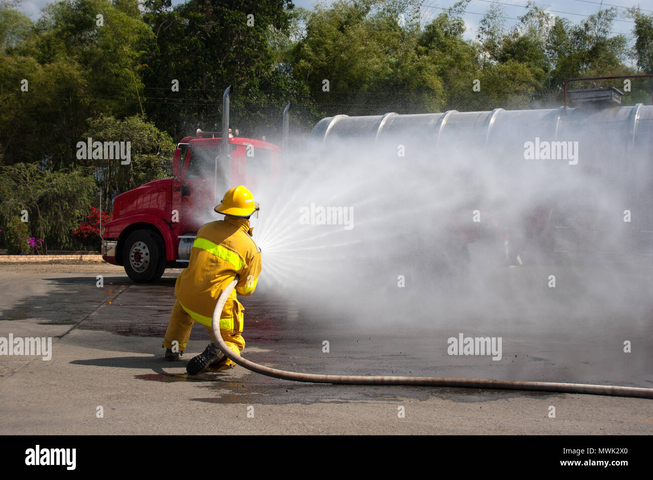 Firefighter fighting For A Fire Attack, During A Training Exercise ...