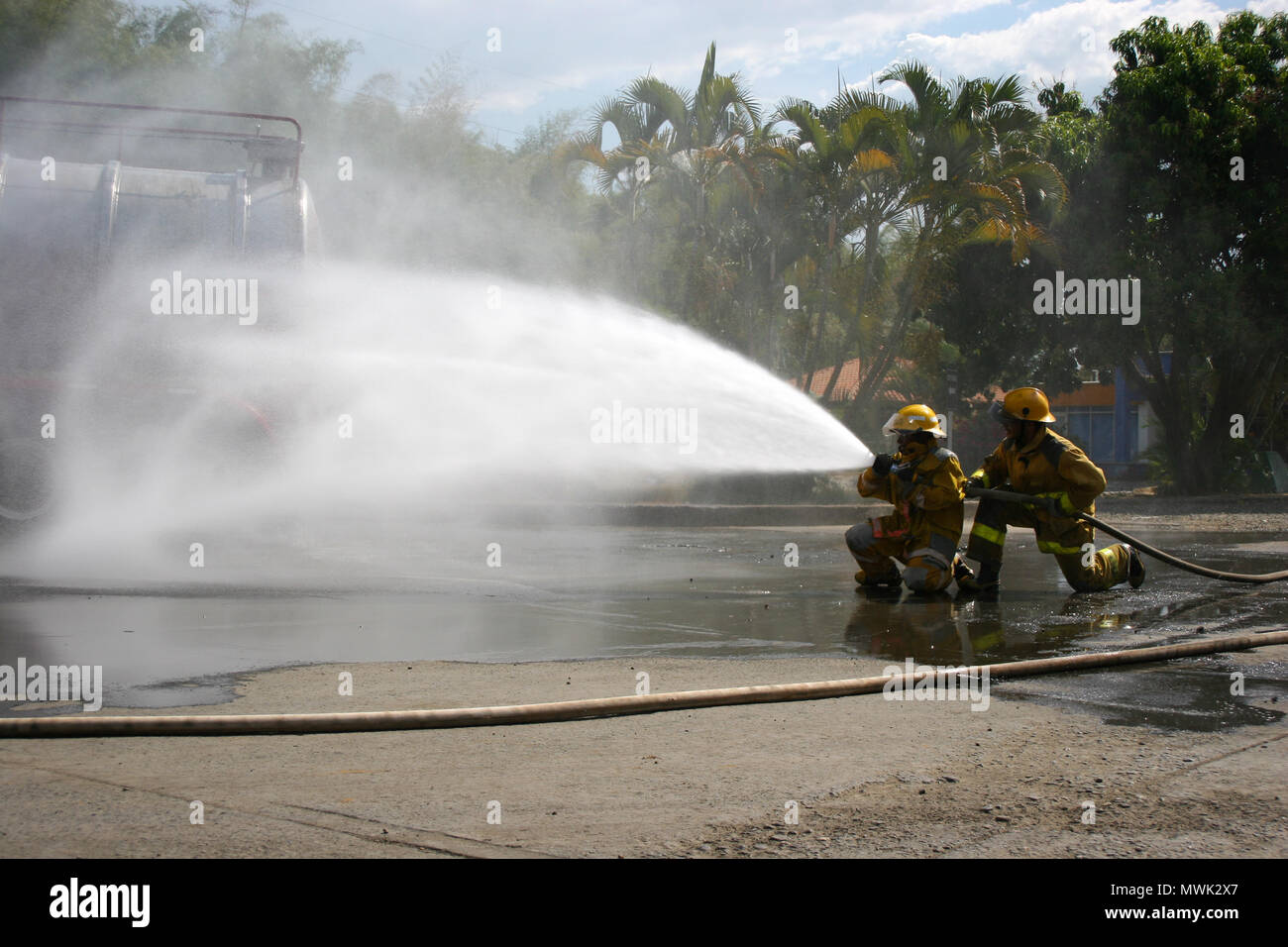 Firefighter fighting For A Fire Attack, During A Training Exercise ...