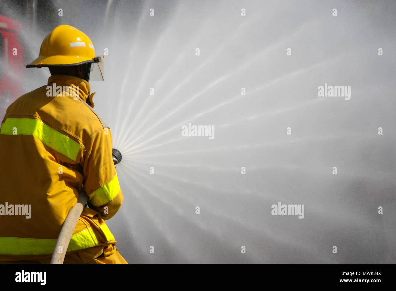 Firefighter fighting For A Fire Attack, During A Training Exercise ...