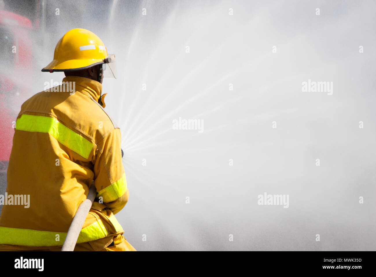 Firefighter fighting For A Fire Attack, During A Training Exercise ...