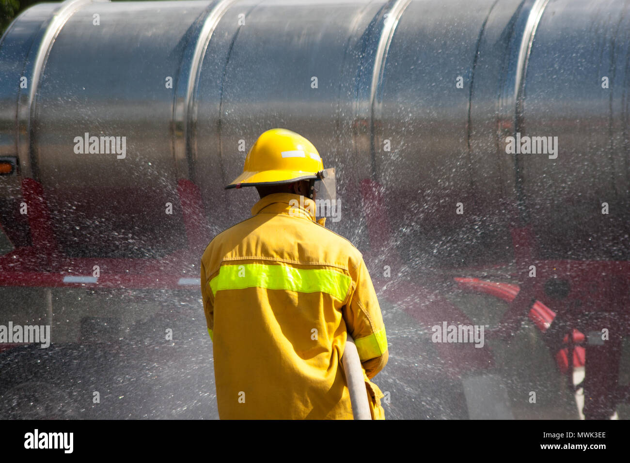 Firefighter fighting For A Fire Attack, During A Training Exercise ...