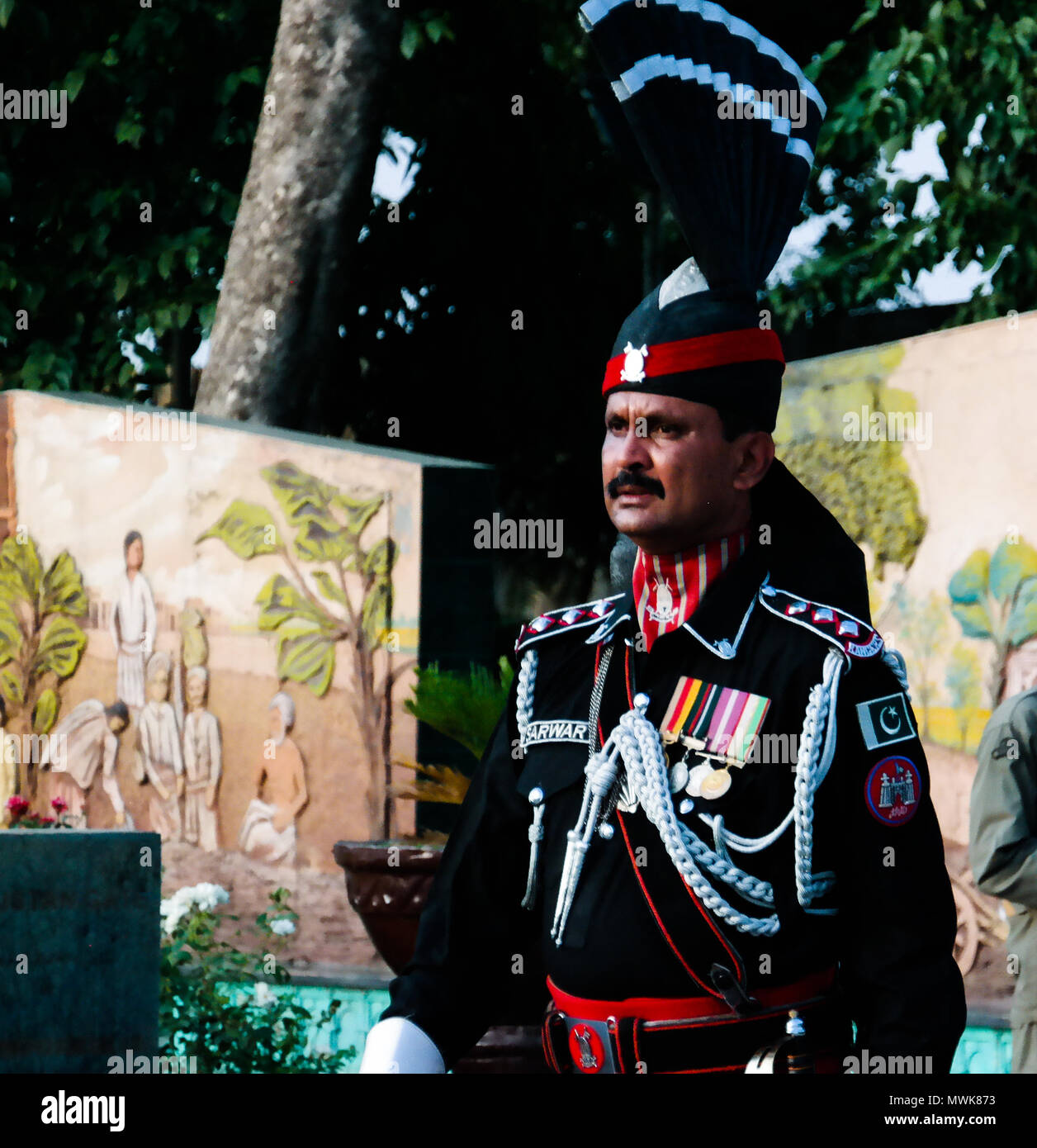 The marching Pakistani guards in national uniform at the ceremony of lowering the flags - 04-05-2015 border between Pakistan and India, Wagah, Lahore, Stock Photo