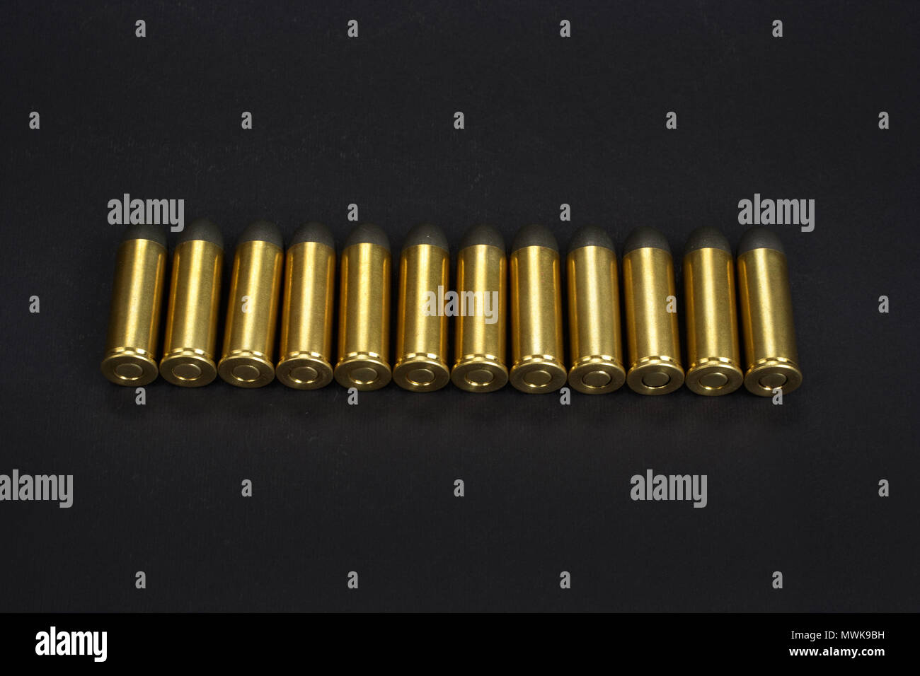 The 45 Caliber Revolver Cartridges On Black Background Stock Photo Alamy