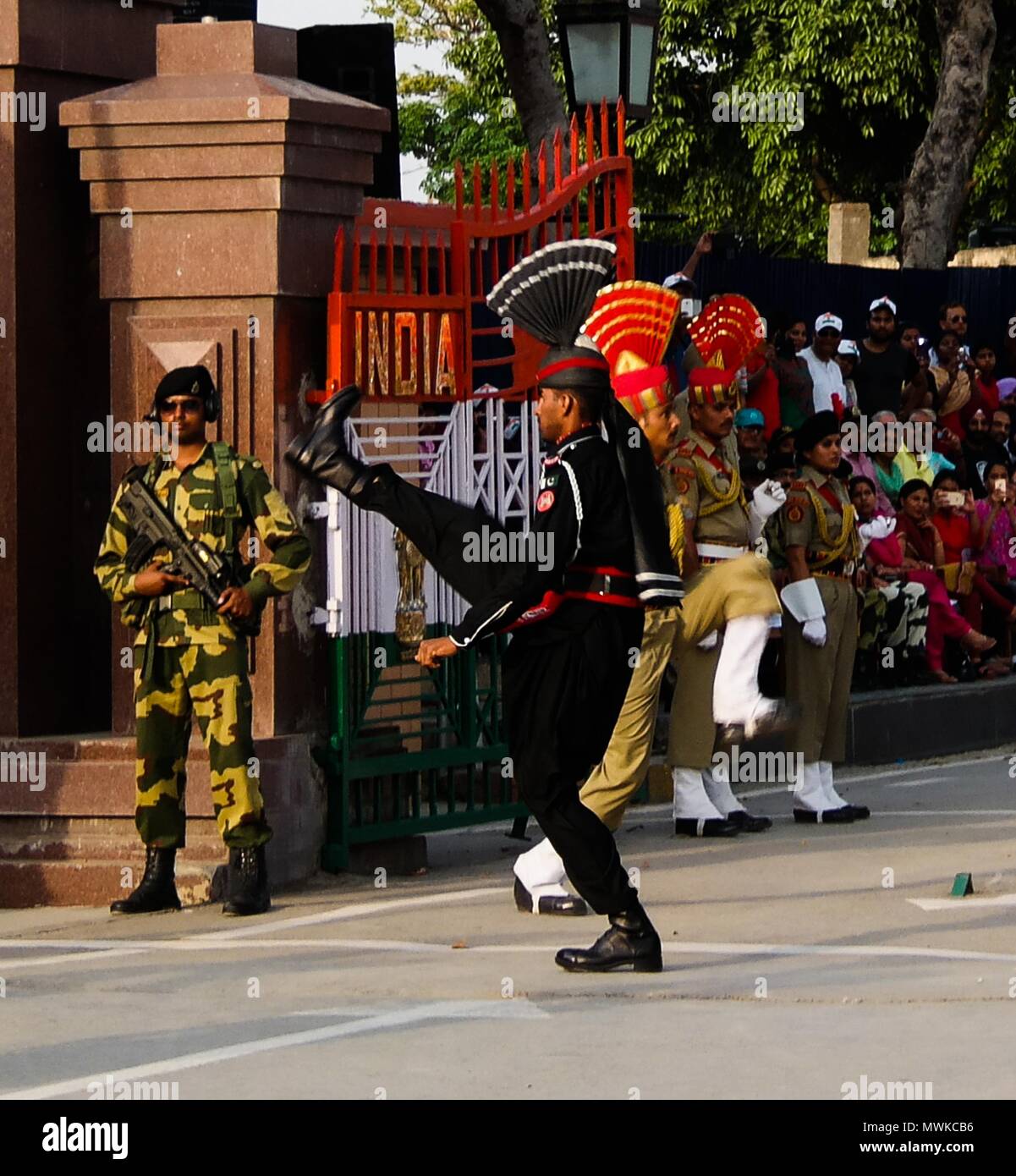 The marching Pakistani and Indian guards in national uniform at the ceremony of lowering the flags - 04-05-2015 border between Pakistan and India, Wag Stock Photo