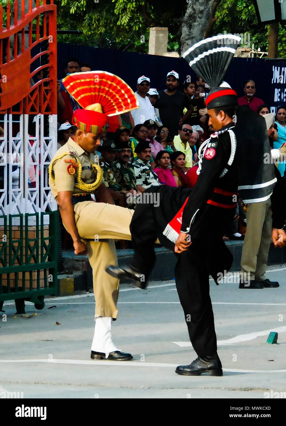 The marching Pakistani and Indian guards in national uniform at the ceremony of lowering the flags - 04-05-2015 border between Pakistan and India, Wag Stock Photo