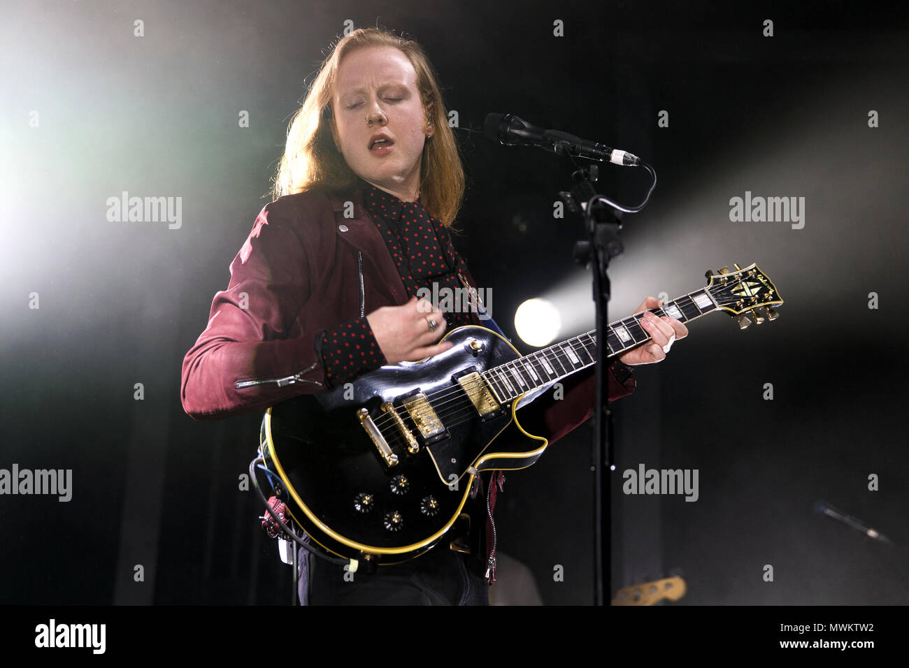 Alex Trimble of Two Door Cinema Club live onstage. Alex Trimble singer, Two  Door Cinema Club singer, Two Door Cinema Club in concert Stock Photo - Alamy