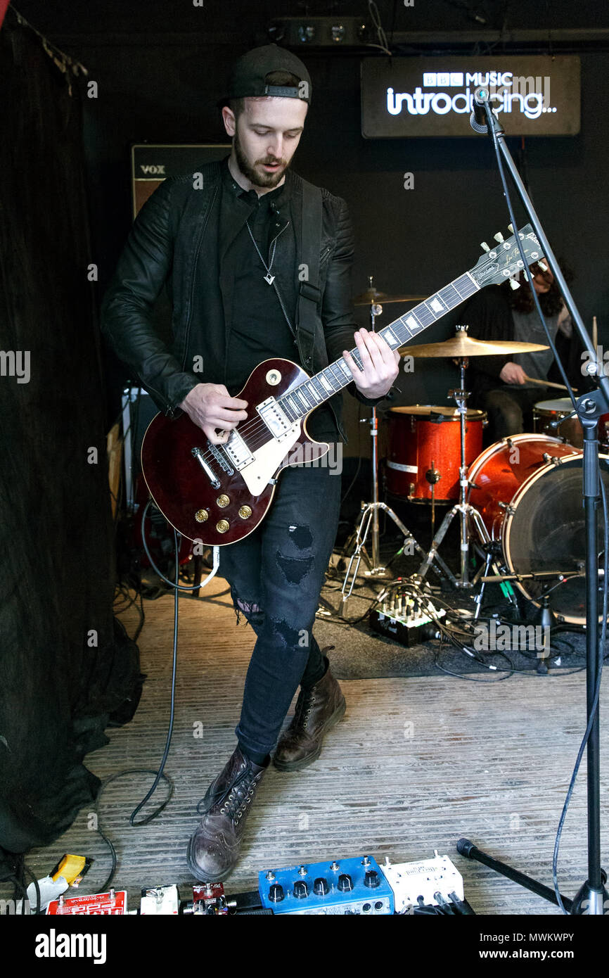Matt Gascoyne, guitarist of Eva Plays Dead, live onstage. Stock Photo