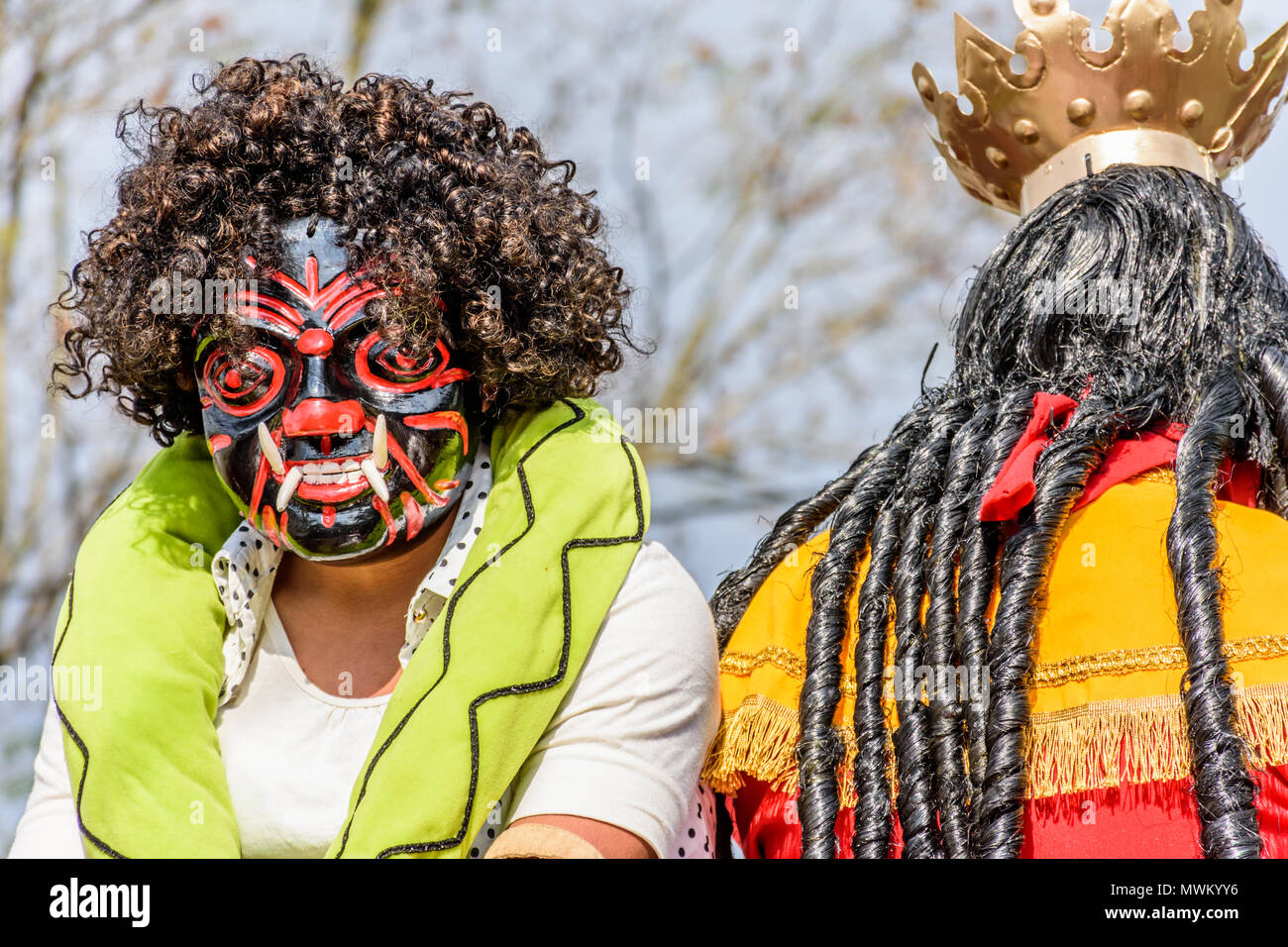 Cuidad Vieja,, Guatemala -  December 7, 2017: Local in traditional folk devil mask in parade celebrating Our Lady of the Immaculate Conception Day Stock Photo